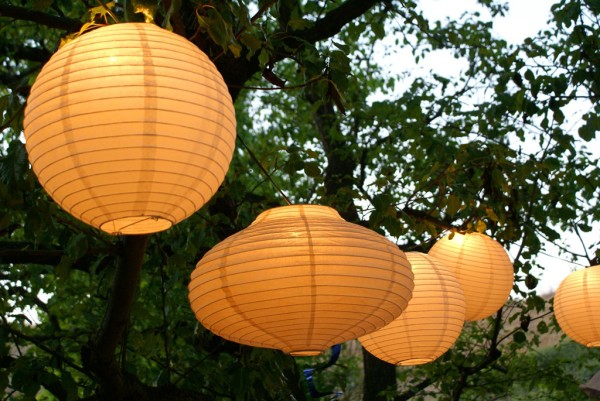 paper lanterns in the trees  