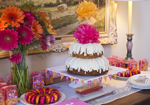 Pink and Orange Birthday Cake and Favors Table