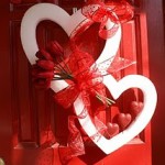 red entry doors with valentine decorations