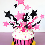 jumbo birthday cupcake with stars and fondant ribbons